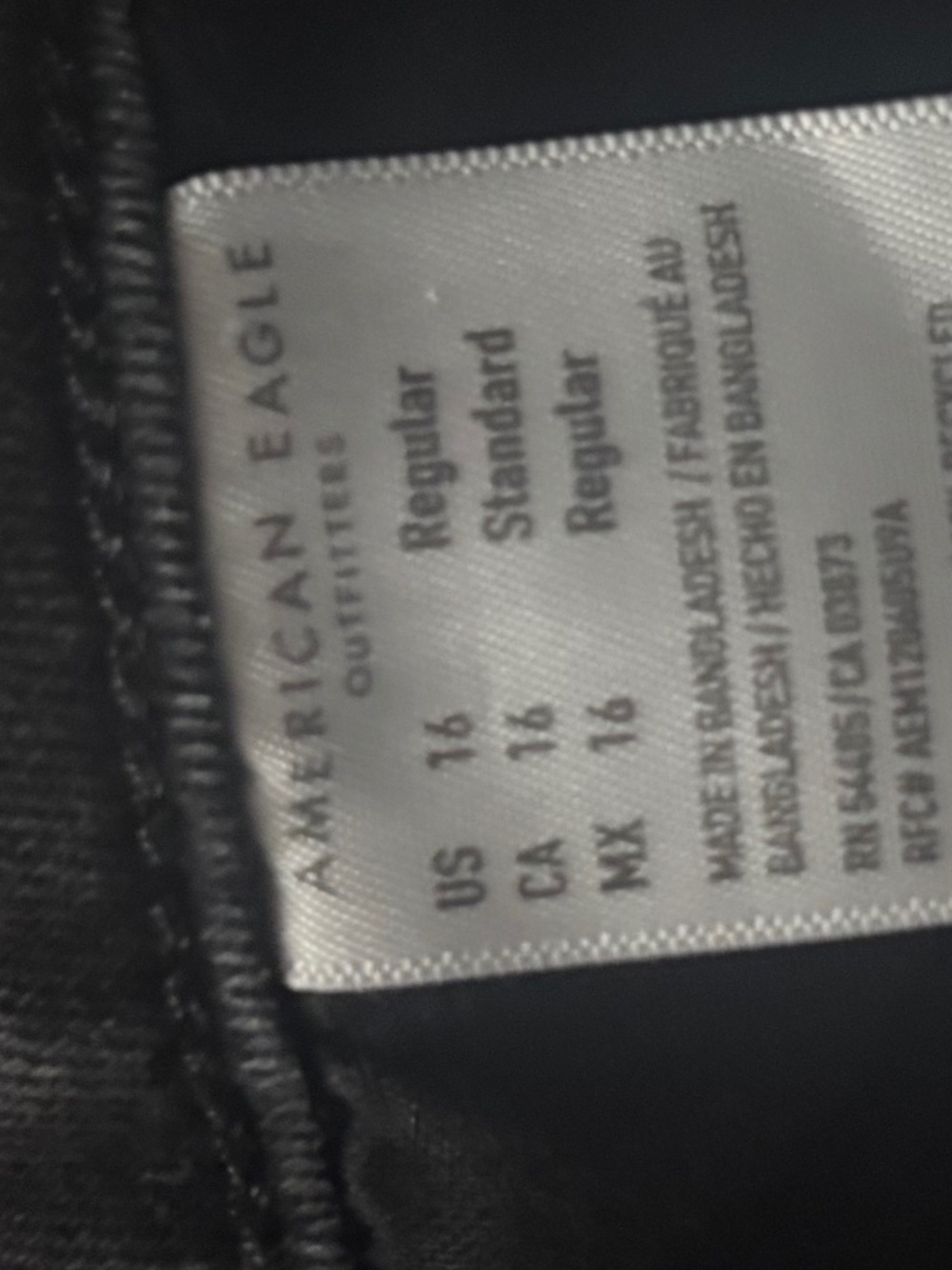 American Eagle black distressed jeans, size 16 Regular.